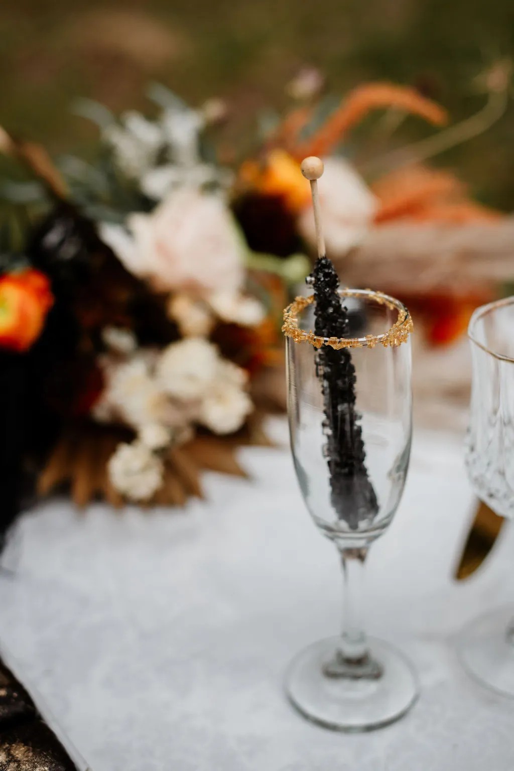 Now can we please see the Halloween wedding table decor, placesettings, and that Halloween wedding cake!?