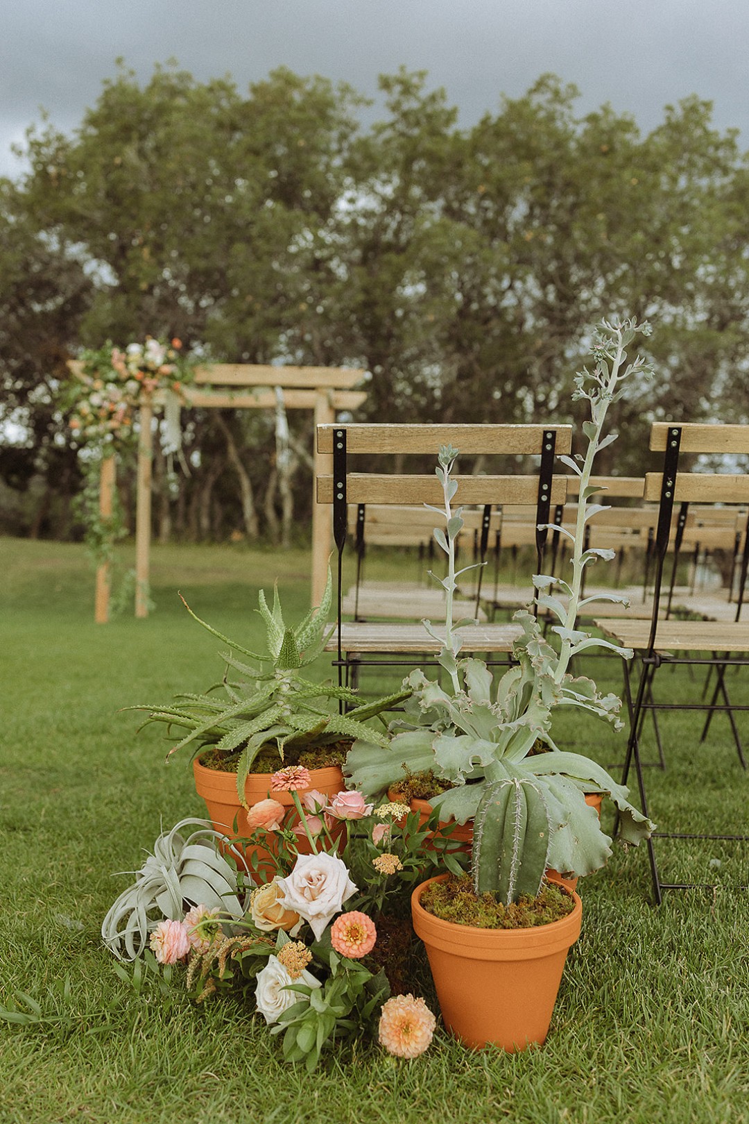 2) You can use potted plants in your wedding by adding them to the ceremony space.