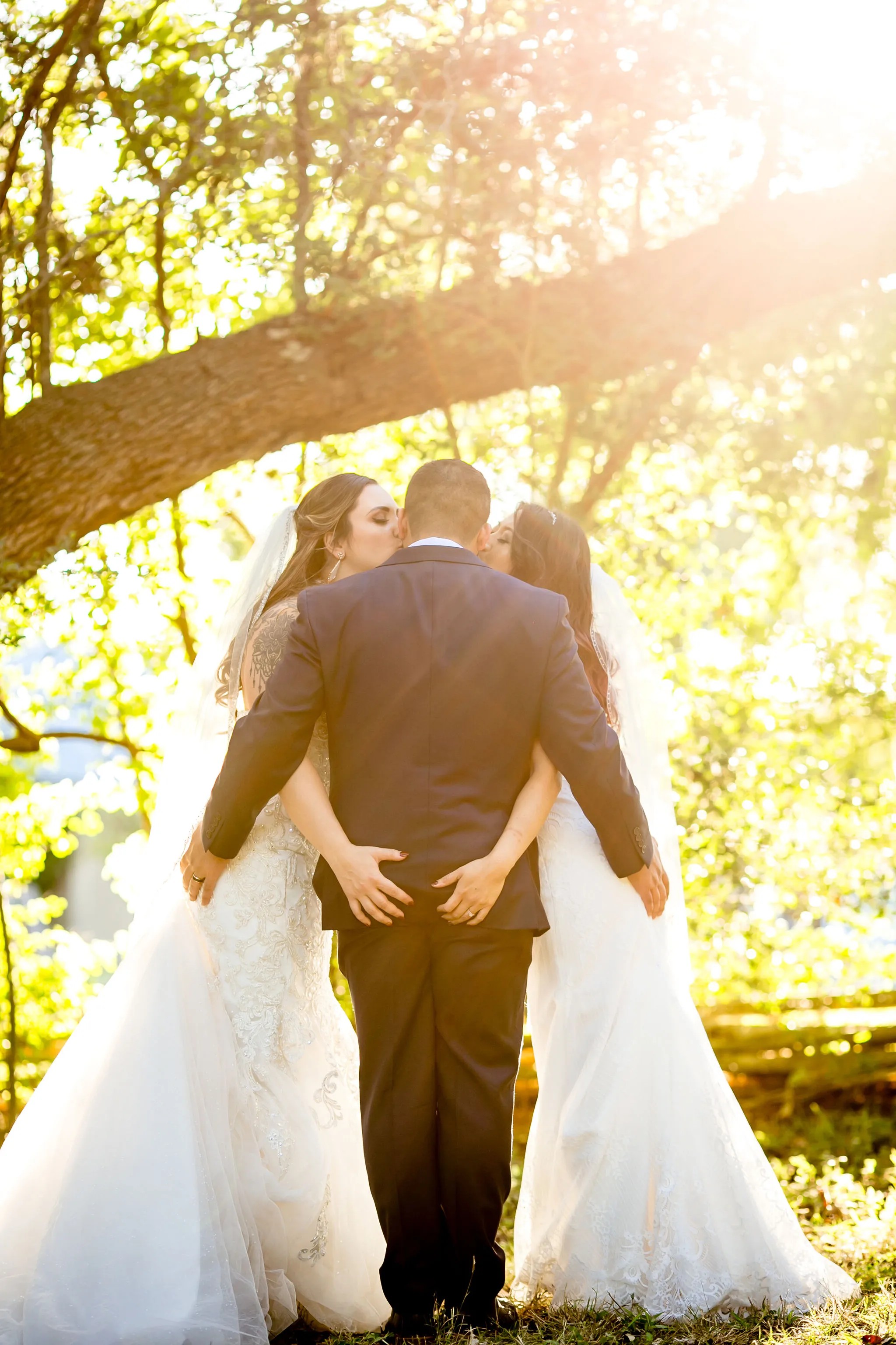 Polyamorous triad wedding portraits