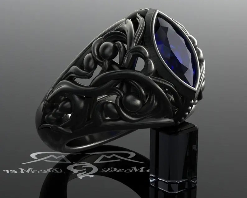 Black wedding rings with blue stones: sapphires, alexandrite, and other natural gemstones