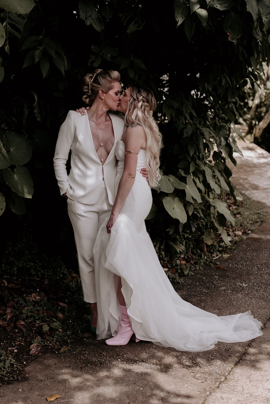 We heart the pink boots with the wedding dress.