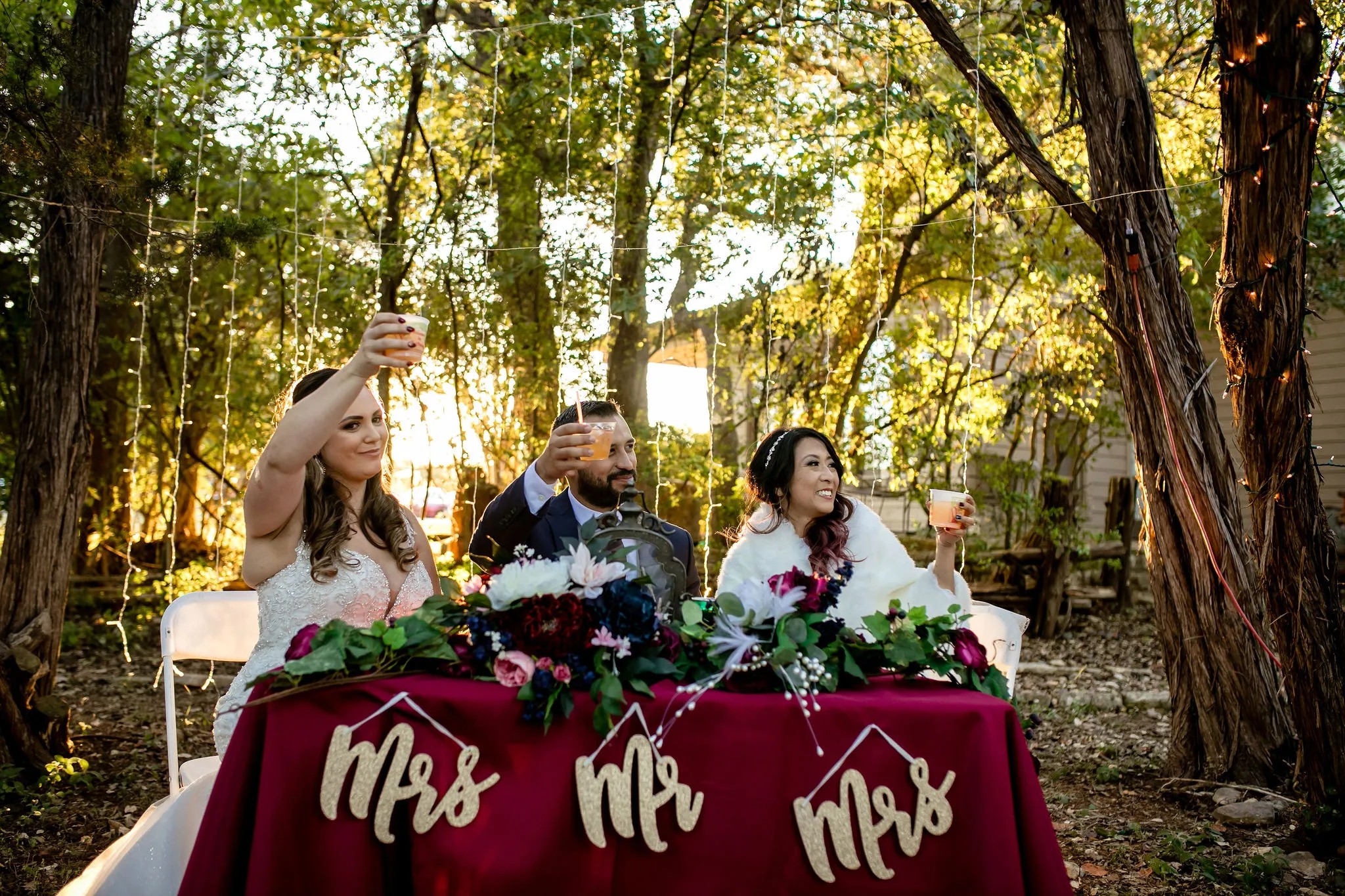 Polyamorous triad wedding reception