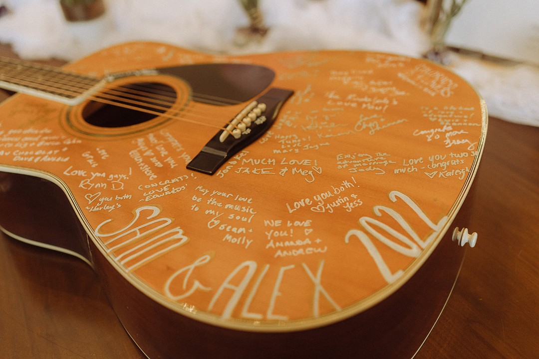 4) Wait till you see how Alex and Samantha incorporated potted plants into their wedding guestbook table!