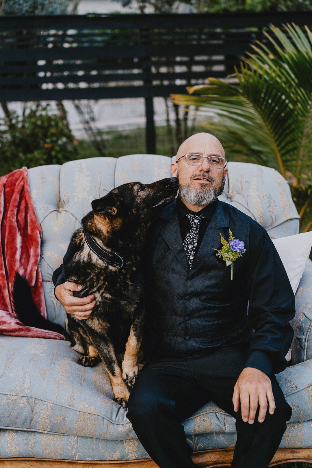 Love the details of this black brocade vest and floral patterned tie.