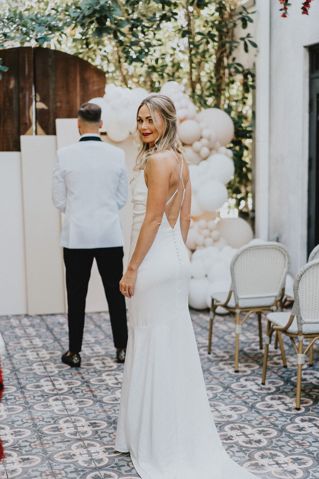 Get ready to pick your jaw off the floor when you see this slip wedding dress.