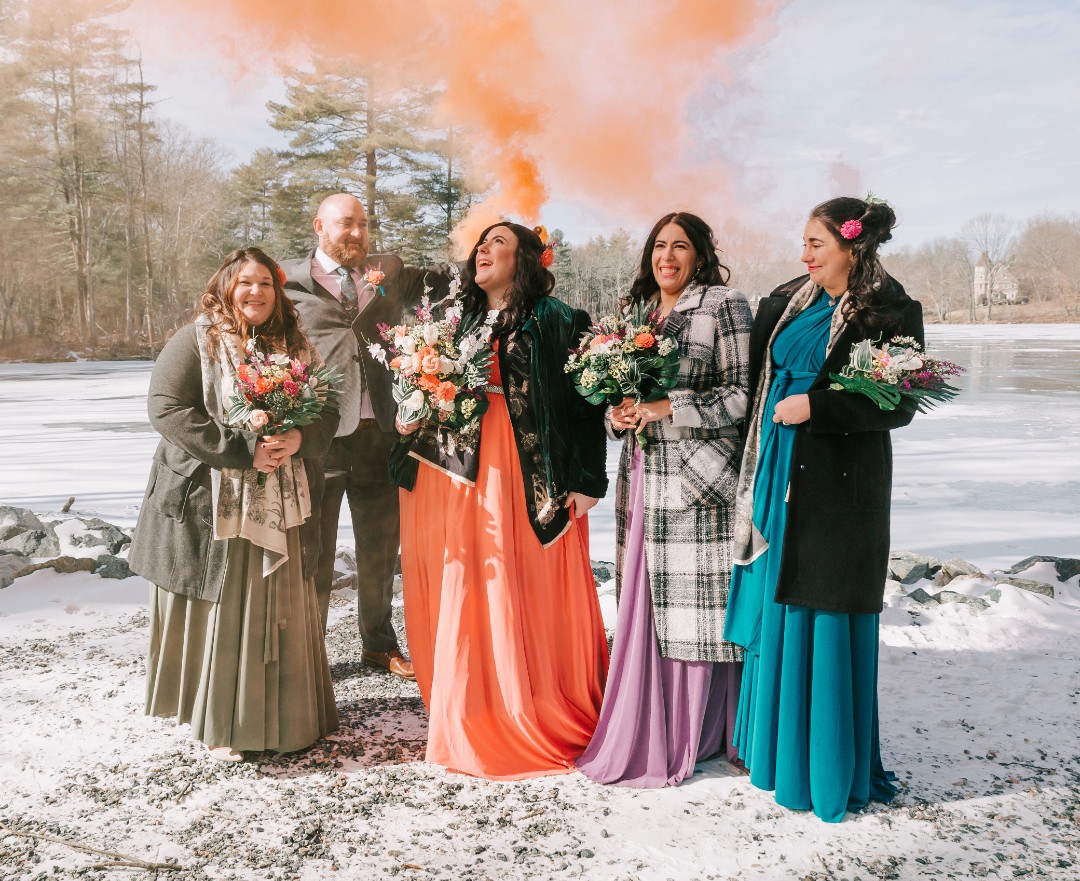 Colorful smoke bombs were used during formal photos at a frozen lake nearby.