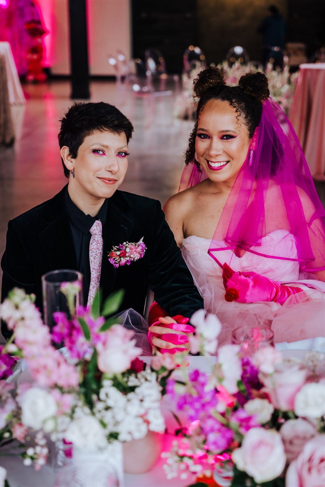 Bring on the neon pink eyeliner for this non-binary Barbiecore wedding!