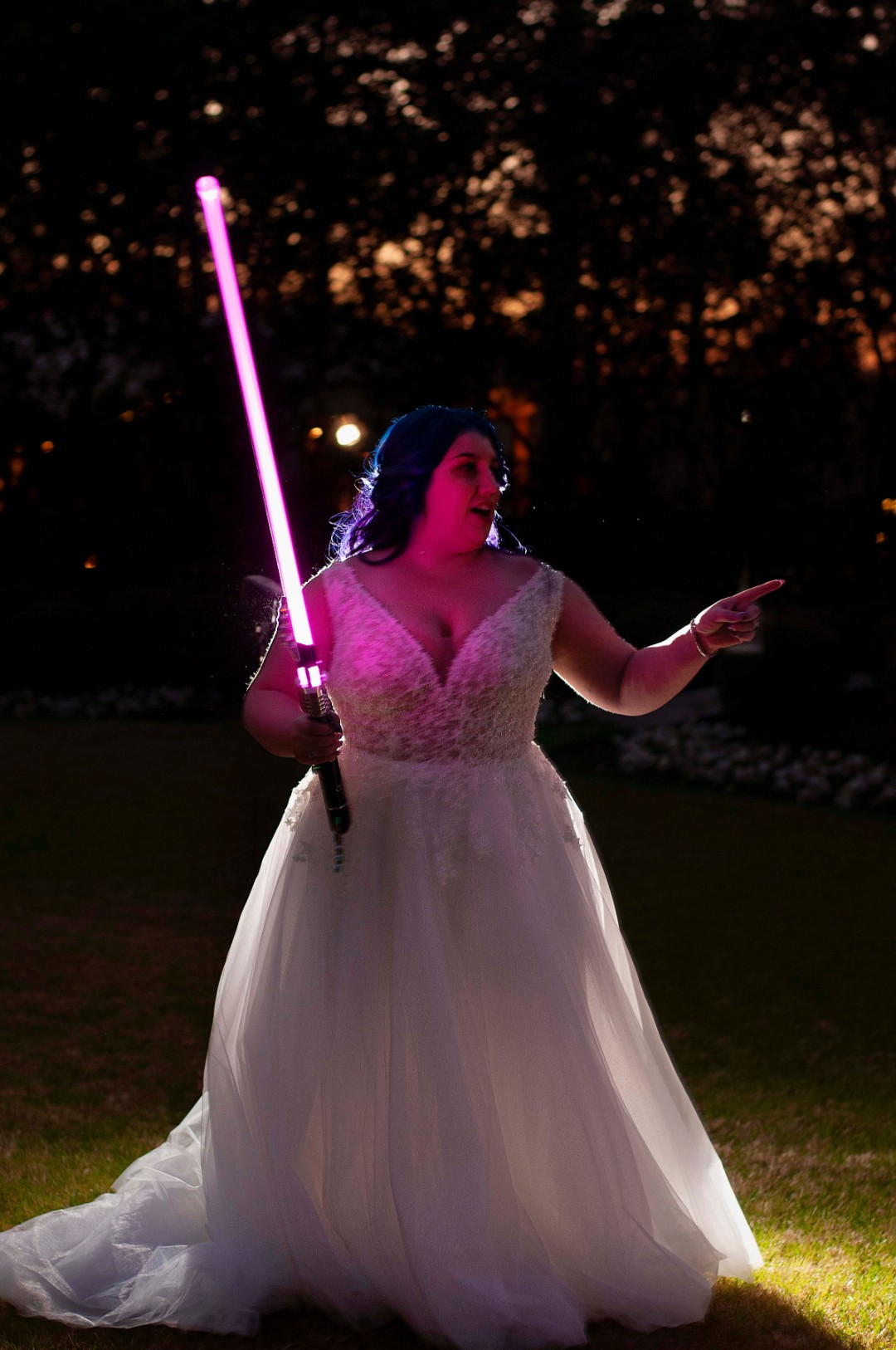 Nothing more bad ass than a bride wielding a light saber on her wedding day.